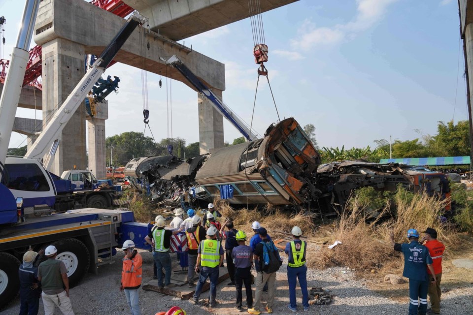 Construction crane falls onto moving train in Thailand, killing at least 29 people