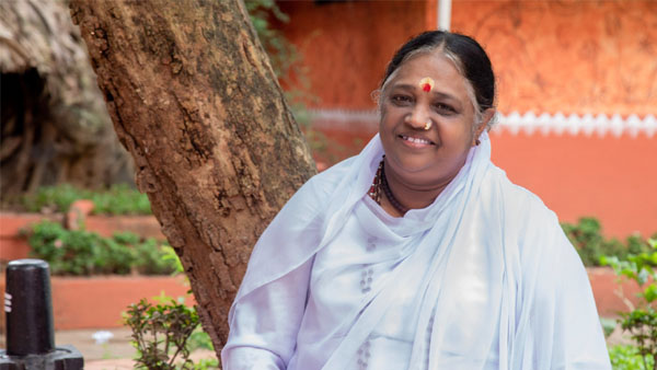 Amma: The Grammar of Compassion in a Fractured World