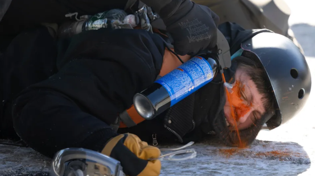 Protesters demand immigration agents leave Minneapolis after man is shot and killed during crackdown