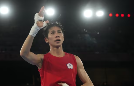 Taiwan Olympic boxing champ involved in gender debate wins first bout at Asian titles