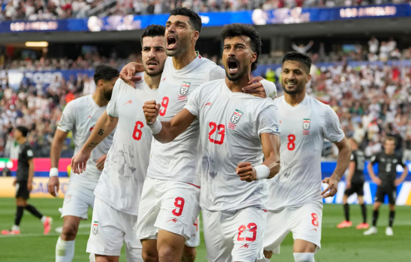 Iran coach says team ordered out of US right after 2-2 draw with New Zealand in WC opener