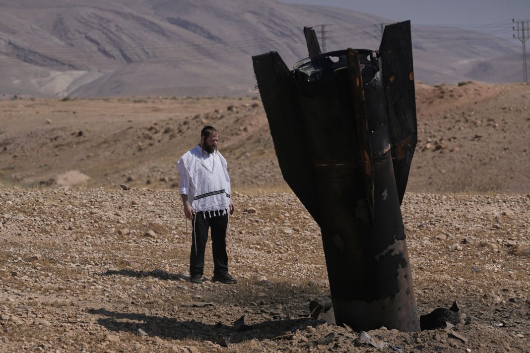 Israel and Iran trade strikes, threatening to drag region back into full-scale war