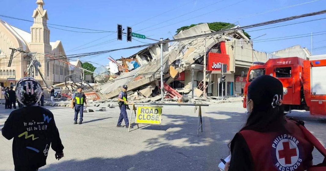 A 7.8 magnitude quake in Philippines kills at least 32, fells buildings and sets off tsunami