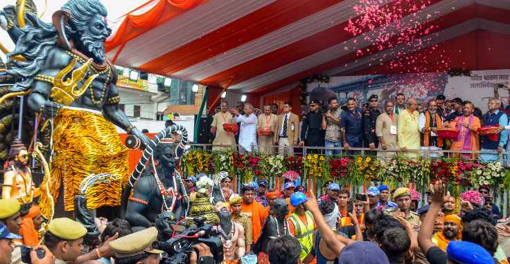 UP CM showers flower petals on Kanwariyas in Meerut