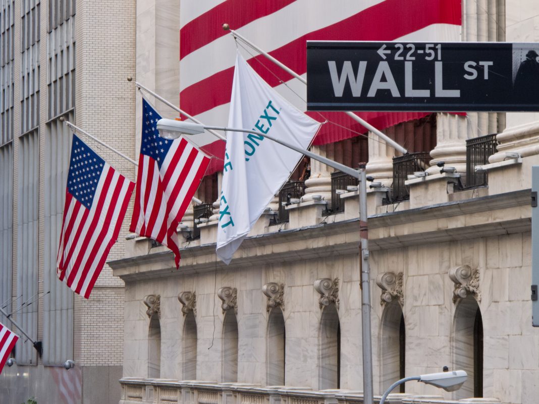 Oil prices edge lower, while Asian shares rise, tracking Wall Street gains