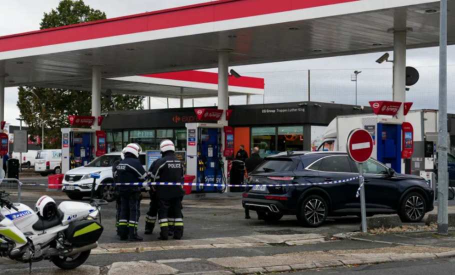 A shooting in the Paris suburbs kills 1 and wounds five in a suspected racist attack