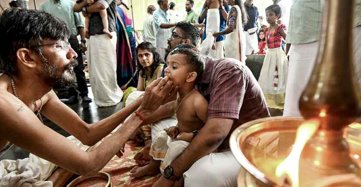 Thousands of toddlers take first steps into learning on Vijayadasami in Keralam